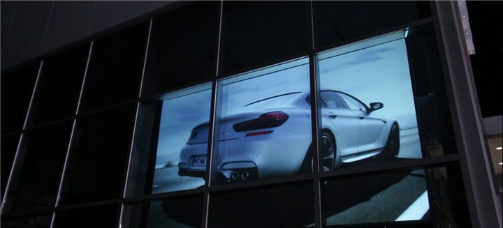 smart film used as projection screen in car shop